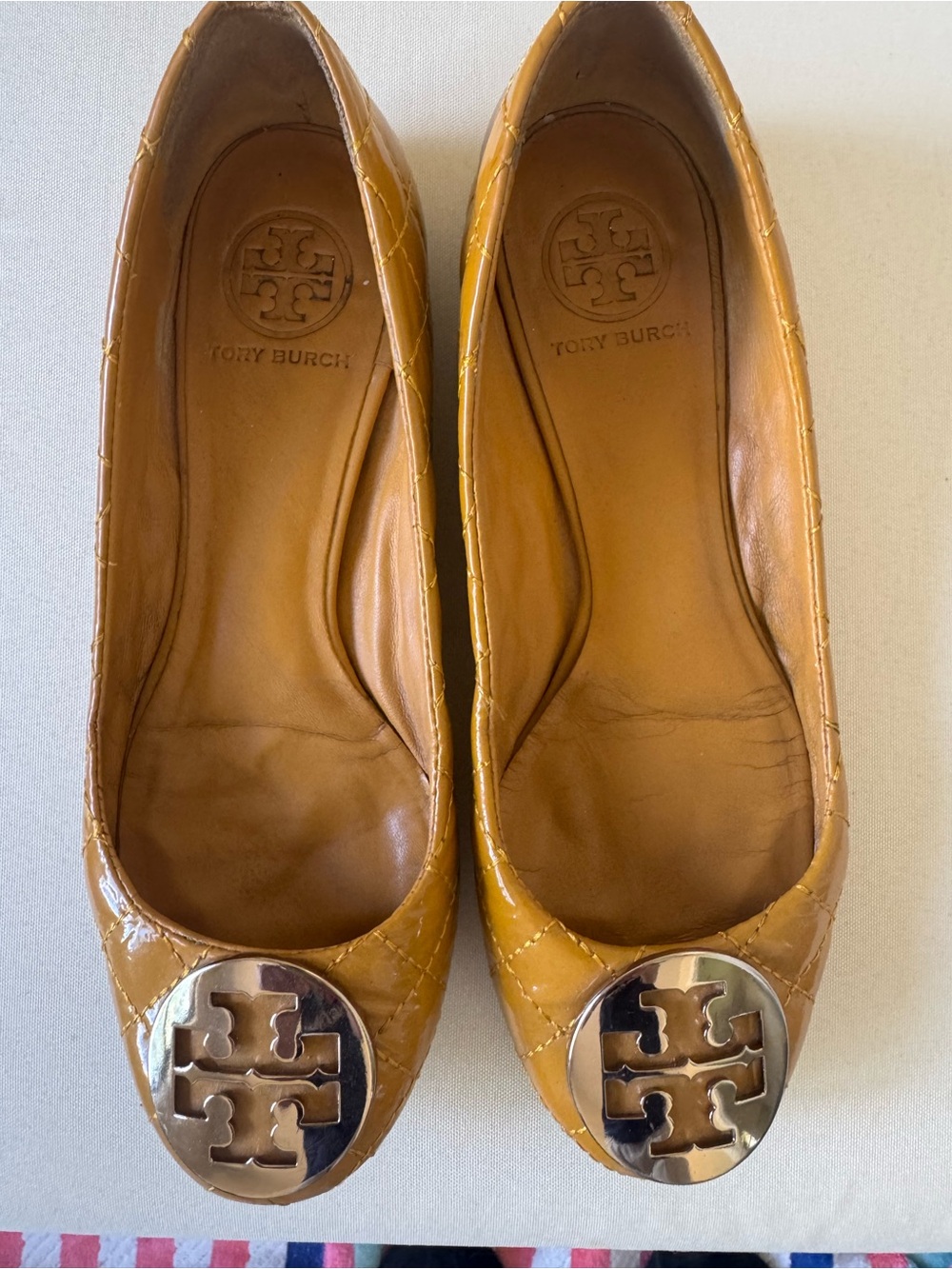 Tory Burch Quilted Mustard Leather Reva Flats with Logo Medallion